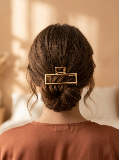 Chérie claw clip worn in a bun from behind