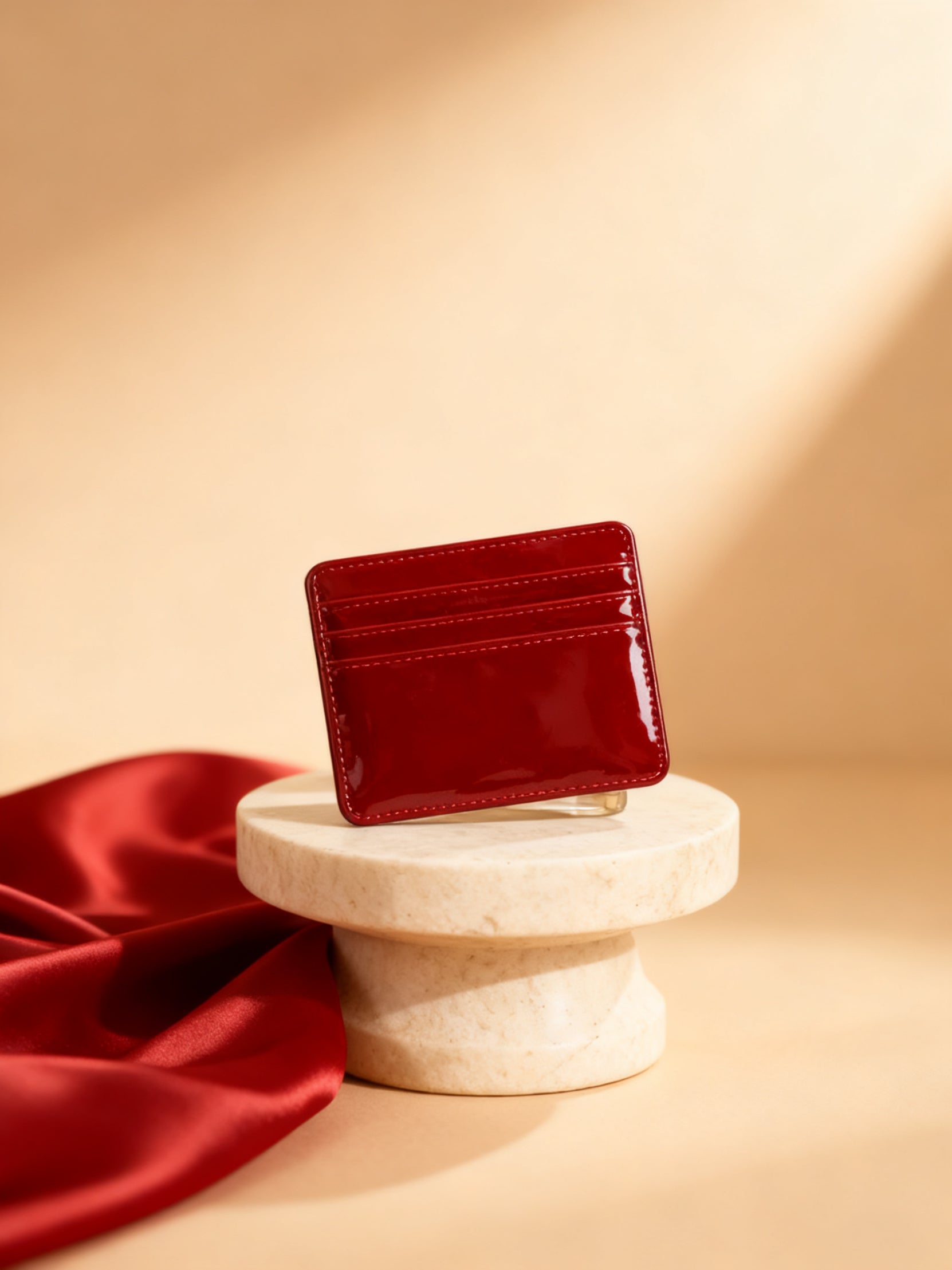Griotte cardholder cherry red glossy patent studio hero