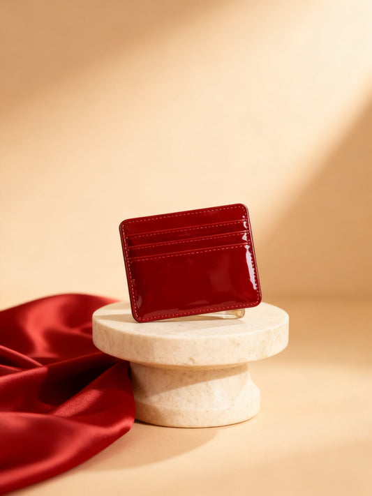 Griotte cardholder cherry red glossy patent studio hero