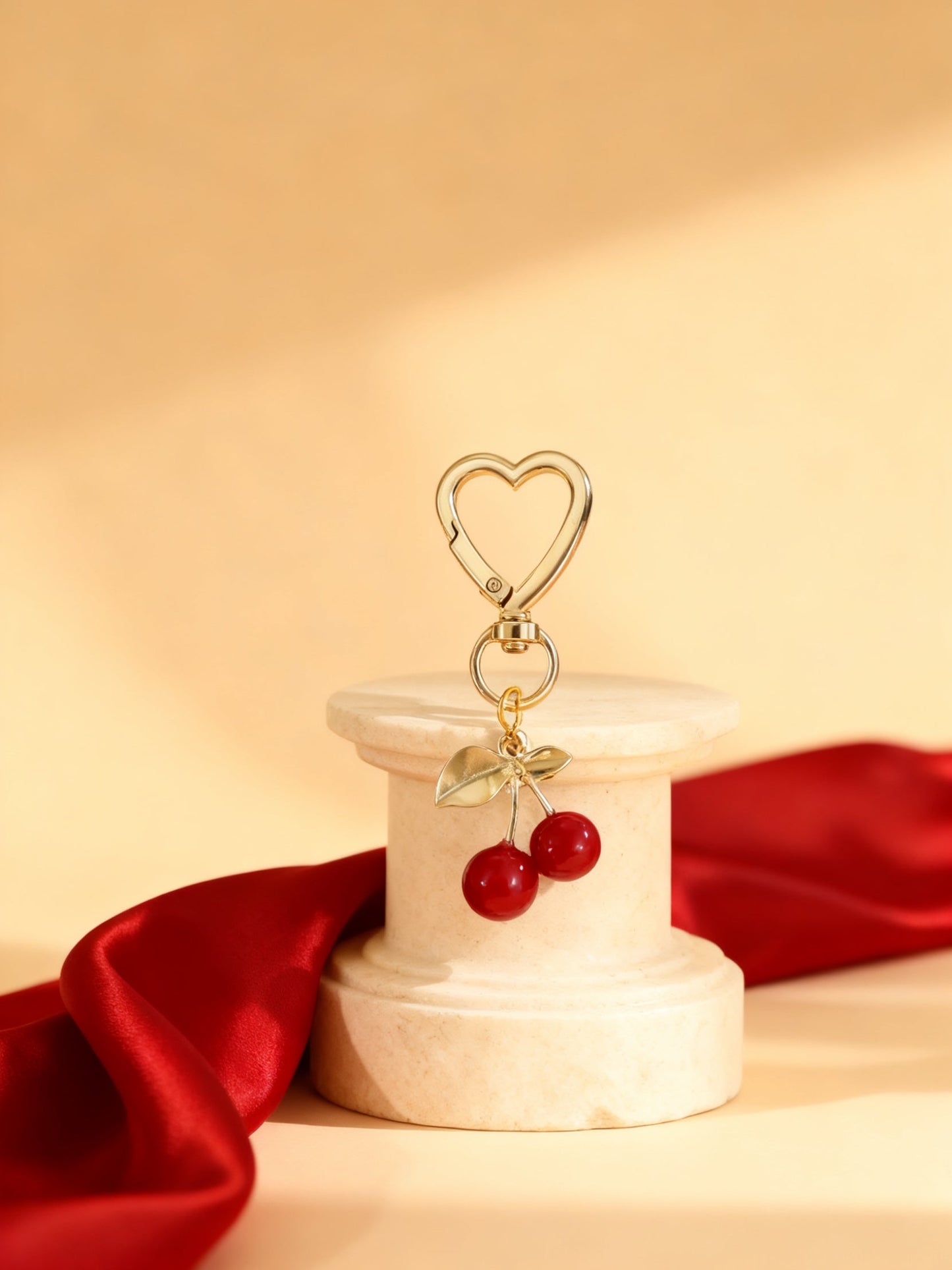 Fleur bag charm studio hero cherry red gold