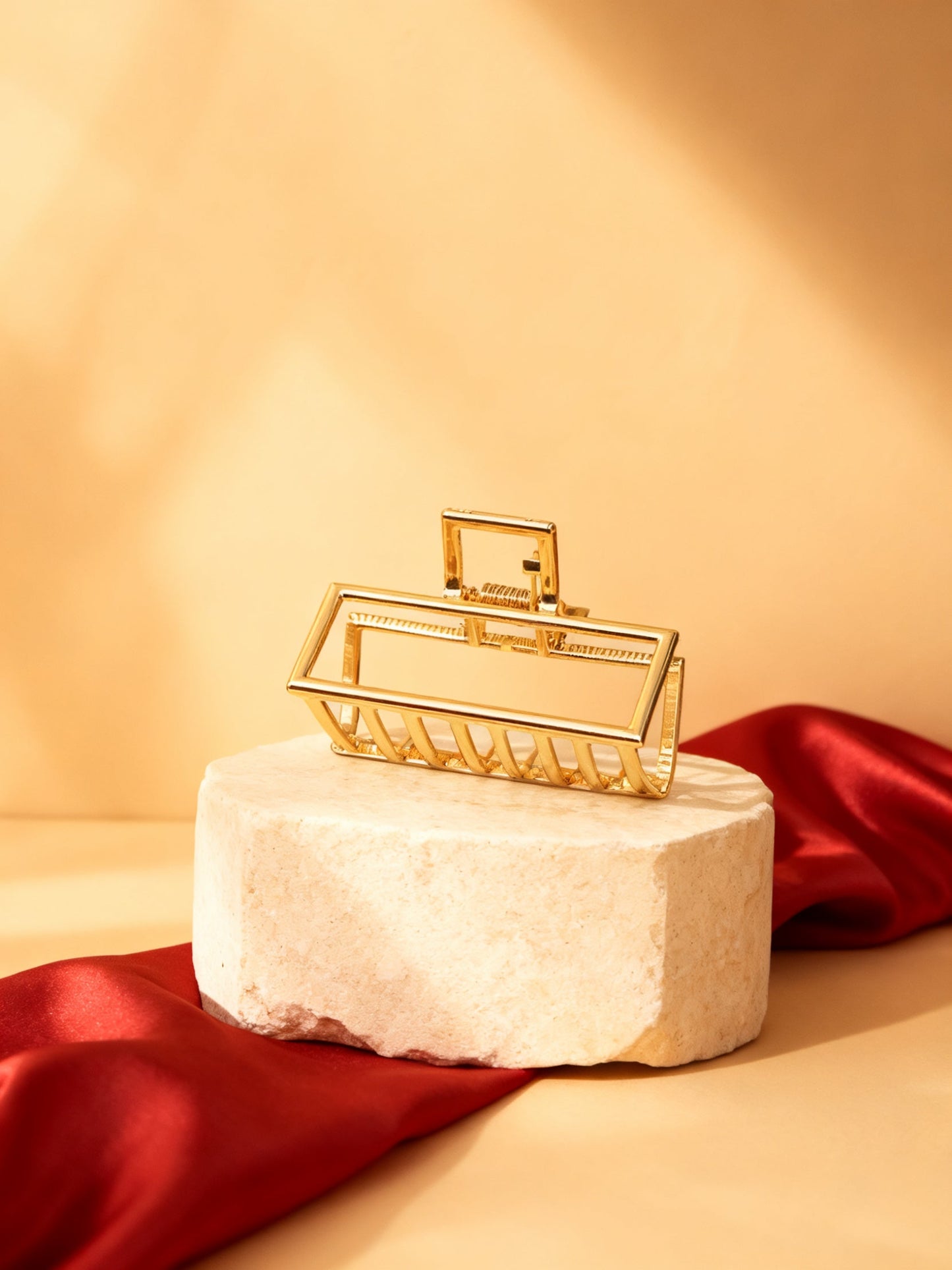 Chérie claw clip gold geometric studio hero