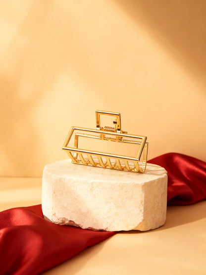 Chérie claw clip gold geometric studio hero